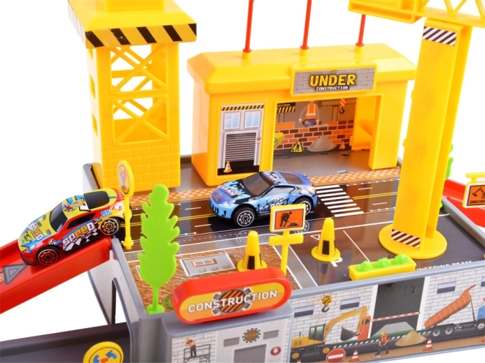 Zona de construcción con grúa y máquinas