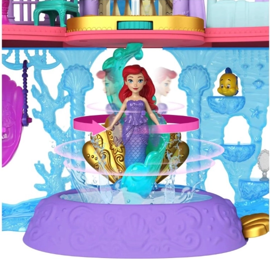 Pista giratoria, columpio y fuente