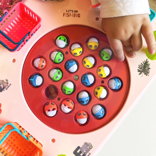 Tablero de juego giratorio y peces magnéticos