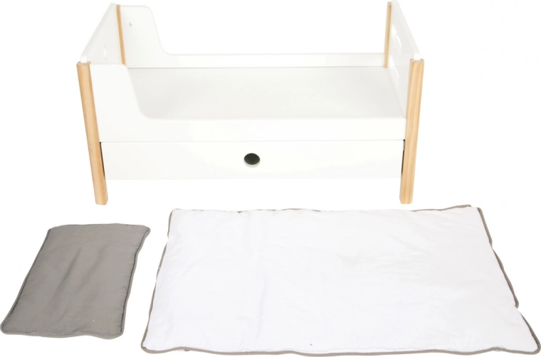 Cajones de almacenaje y ropa de cama neutra