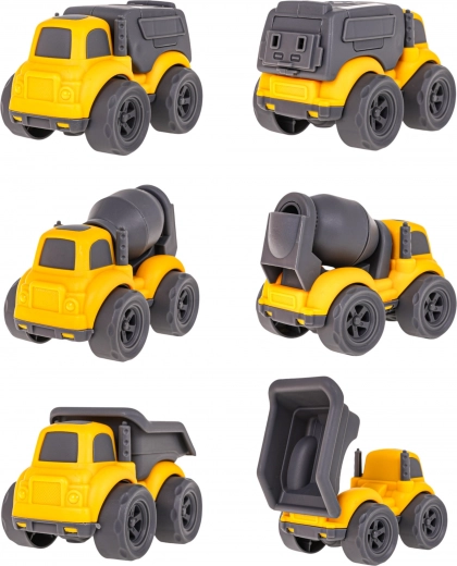 Tres vehículos de construcción con elementos móviles