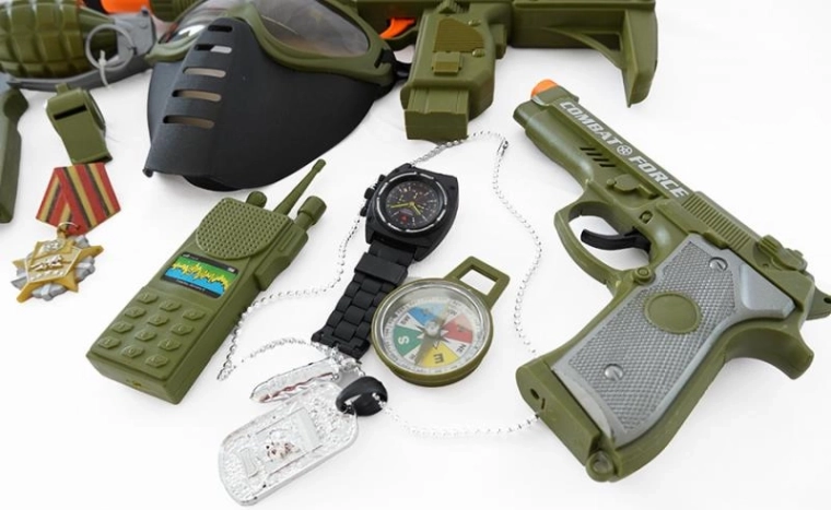 Pistola con efectos a pilas