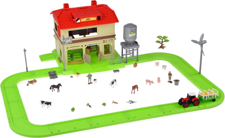 Tractor con remolque y figuras de animales